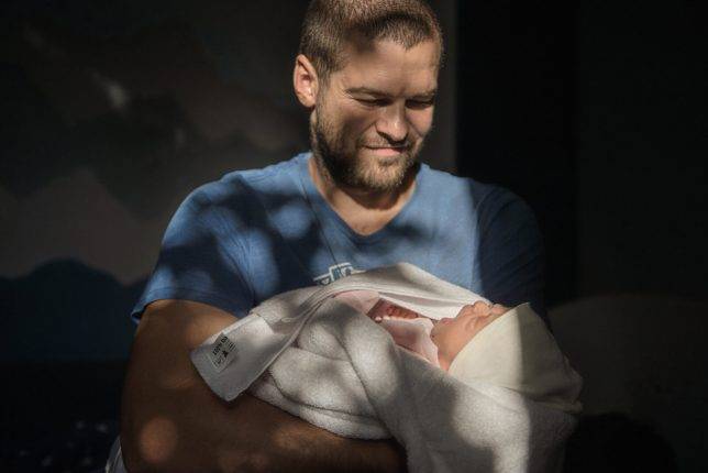 Andrei holds his new-born daughter. Andrei’s wife Polina was sentenced to one and a half years of open prison, and Andrei to one and a half years in a penal colony for participating in protests in Brest. Photo: Pasha Kritchko