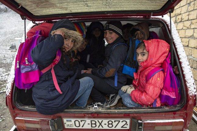 Because there is only one vehicle in the village, only some of the children can take advantage of the car. The rest are either taken to school by their parents, or have to skip classes. Photo: Orkhan Azimov