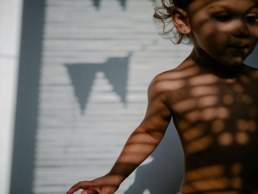Amelia playing with shadows while visiting her grandparents. Photo: Katerina Shosheva