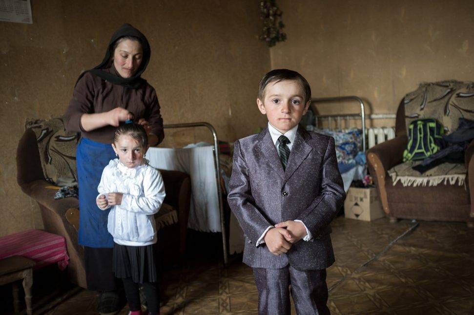 Emine prepares children for the first day of school. Photo: Natela Grigalashvili