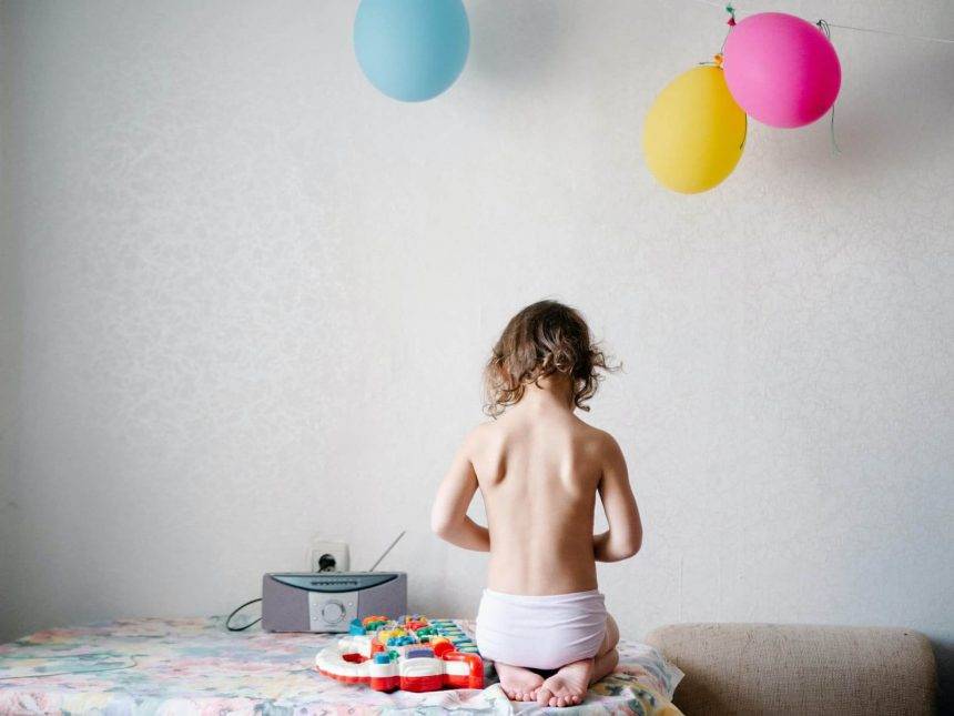 Amelia exploring radio stations when visiting her grandparents. Photo: Katerina Shosheva
